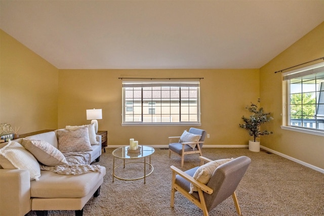 341 Northgate Loop, Helena, MT 59602 - carpeted living room featuring vaulted ceiling and baseboards