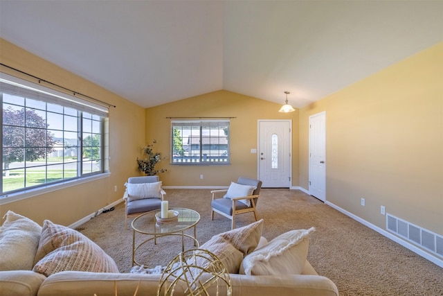 341 Northgate Loop, Helena, MT 59602 - living room with vaulted ceiling and carpet flooring