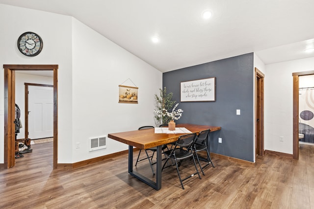 44 Kamloops Rd, Power, MT 59468 - dining room with vaulted ceiling, wood finished floors, and recessed lighting