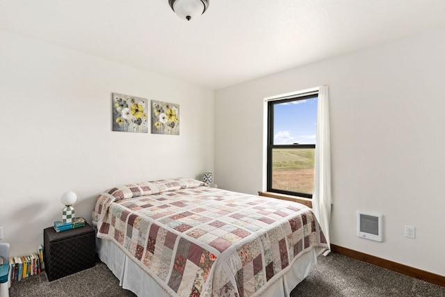 44 Kamloops Rd, Power, MT 59468 - carpeted bedroom with heating unit and baseboards