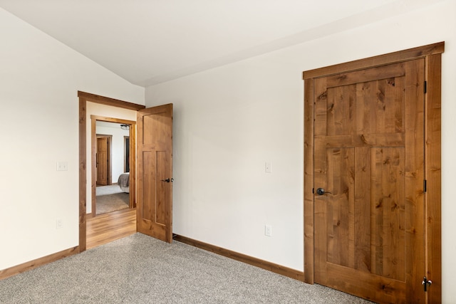 44 Kamloops Rd, Power, MT 59468 - carpeted spare room with baseboards and vaulted ceiling