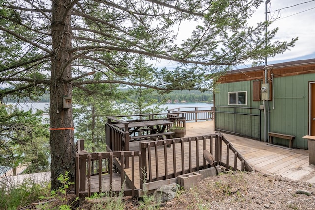 29276 White Swan Rd, Polson, MT 59860 - wooden terrace featuring a water view
