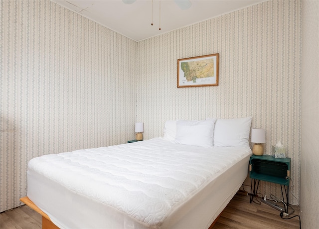 29276 White Swan Rd, Polson, MT 59860 - bedroom featuring wood finished floors and ceiling fan