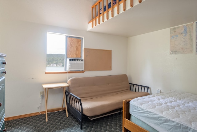 29276 White Swan Rd, Polson, MT 59860 - carpeted bedroom featuring baseboards and cooling unit