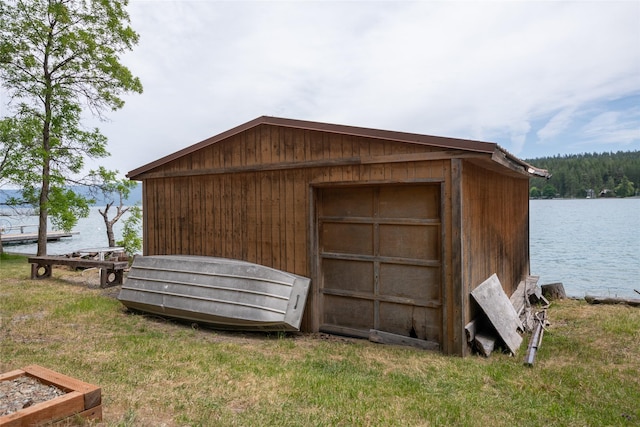 29276 White Swan Rd, Polson, MT 59860 - view of outbuilding with a water view
