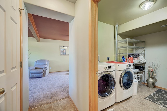 5835 Winter Wheat Dr, Helena, MT 59602 - laundry room featuring washer and clothes dryer, tile patterned flooring, and carpet floors