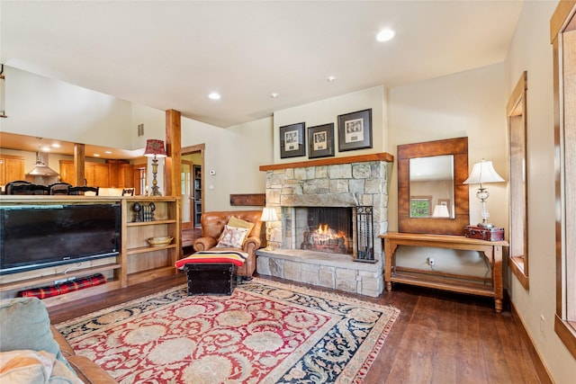 220 Cliff Creek Rd, Whitefish, MT 59937 - living area featuring a stone fireplace, hardwood / wood-style flooring, and recessed lighting
