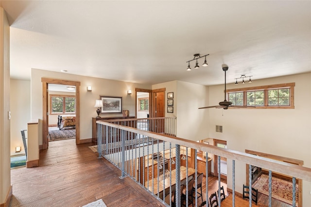 220 Cliff Creek Rd, Whitefish, MT 59937 - corridor featuring an upstairs landing and wood finished floors