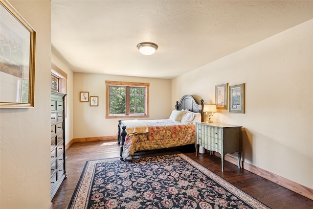 220 Cliff Creek Rd, Whitefish, MT 59937 - bedroom with wood finished floors and baseboards