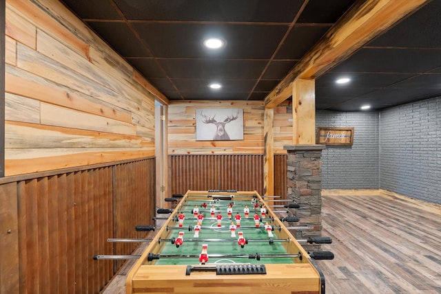 149 Meadow Vista Ln, Deer Lodge, MT 59722 - recreation room with wood finished floors, wood walls, and recessed lighting