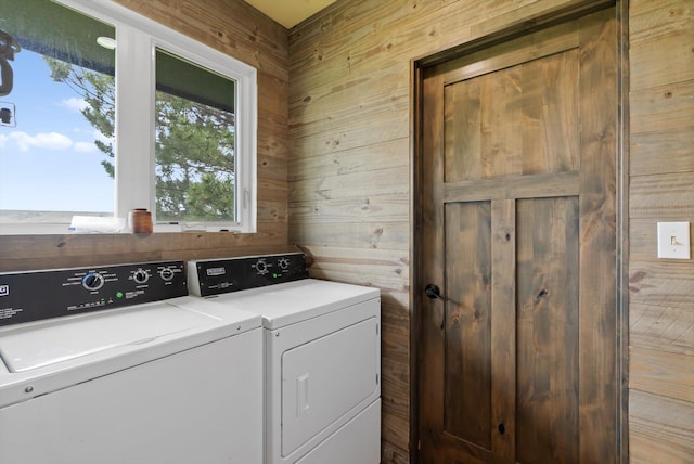 149 Meadow Vista Ln, Deer Lodge, MT 59722 - laundry room featuring washer and dryer and wooden walls