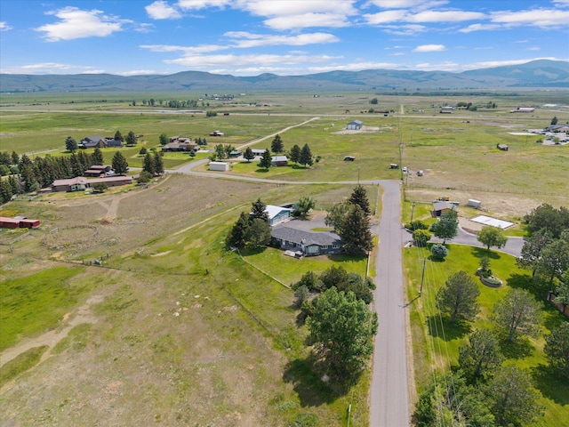 149 Meadow Vista Ln, Deer Lodge, MT 59722 - aerial view of sparsely populated area featuring a mountain backdrop