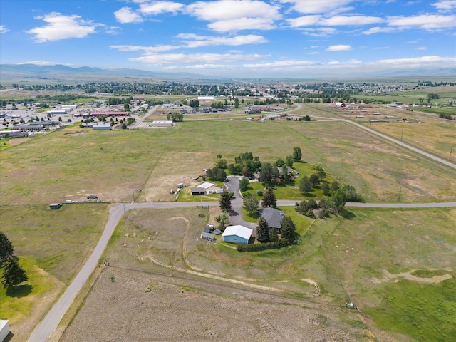 149 Meadow Vista Ln, Deer Lodge, MT 59722 - aerial overview of property's location featuring rural landscape and mountains