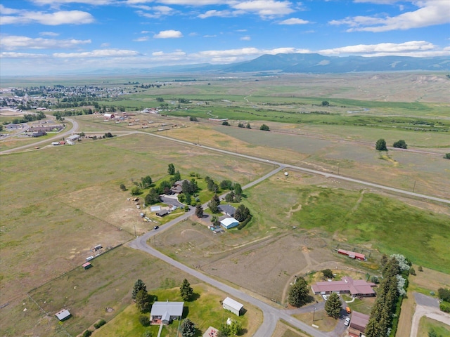149 Meadow Vista Ln, Deer Lodge, MT 59722 - aerial view of property and surrounding area with rural landscape and a mountainous background