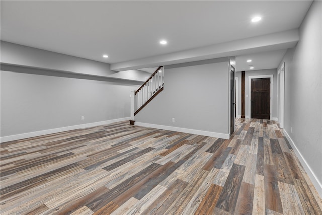 60951 Sparky Dr, Saint Ignatius, MT 59865 - finished below grade area with wood finished floors, recessed lighting, and stairway