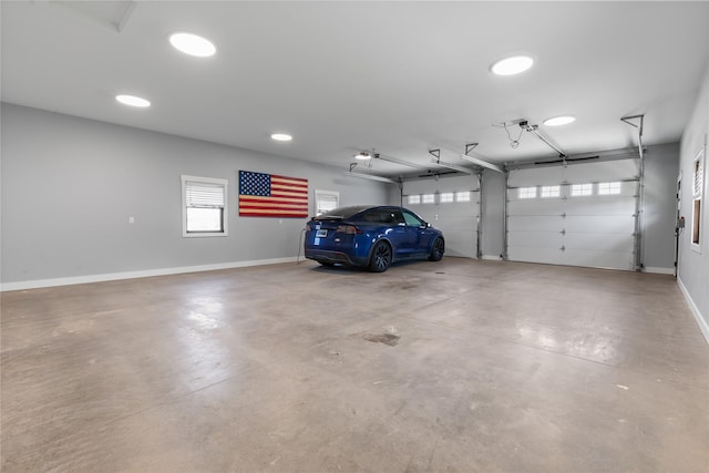 60951 Sparky Dr, Saint Ignatius, MT 59865 - garage featuring baseboards and recessed lighting