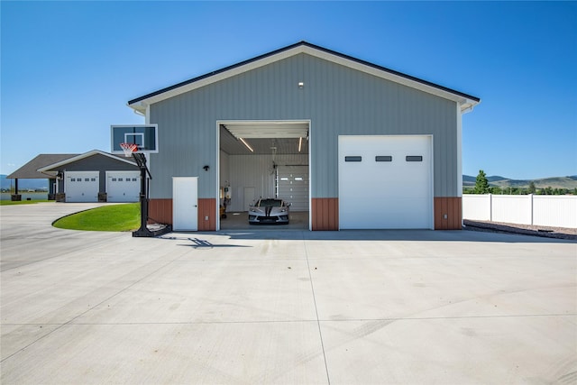 60951 Sparky Dr, Saint Ignatius, MT 59865 - detached garage featuring a mountain view