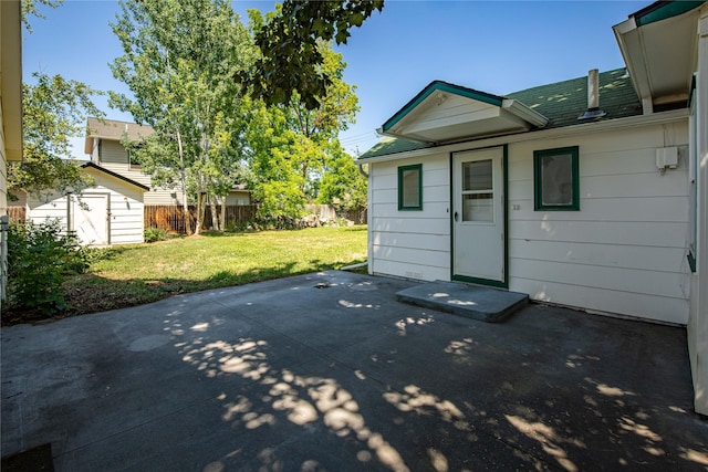 432 Willow Creek Rd, Corvallis, MT 59828 - view of patio / terrace with a storage unit