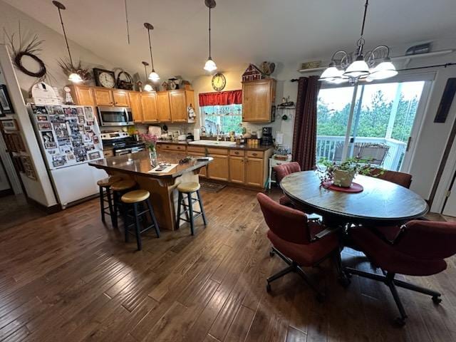 41052 Canyon View Dr, Polson, MT 59860 - dining room with a chandelier and dark wood-type flooring