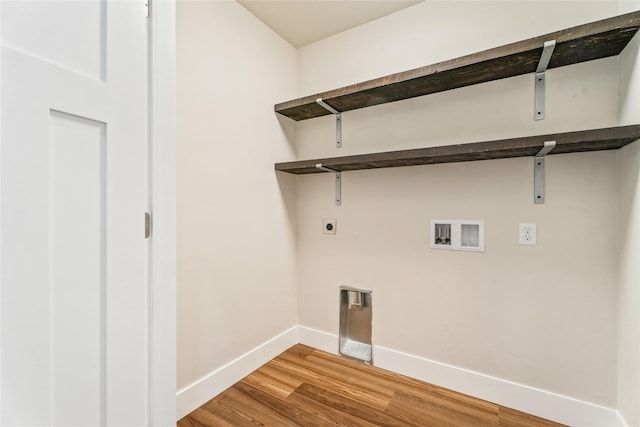 37 S Rodney St, Helena, MT 59601 - laundry room featuring electric dryer hookup, hookup for a washing machine, and light wood-type flooring