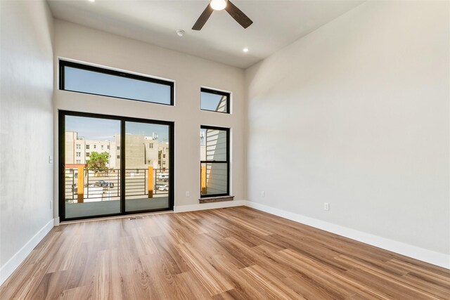 37 S Rodney St, Helena, MT 59601 - spare room featuring light wood-type flooring, a ceiling fan, recessed lighting, and a high ceiling