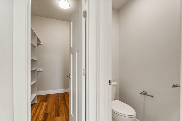 37 S Rodney St, Helena, MT 59601 - bathroom featuring wood finished floors and toilet