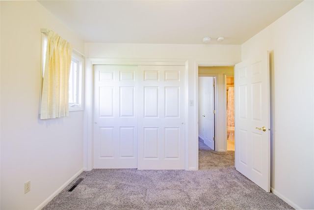 3455 N Hillcrest Dr, Butte, MT 59701 - unfurnished bedroom featuring carpet floors and a closet