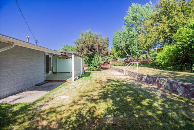 3455 N Hillcrest Dr, Butte, MT 59701 - view of green lawn with a deck