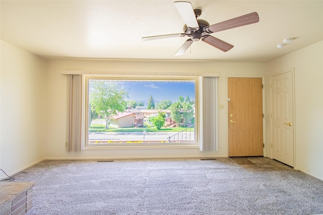 3455 N Hillcrest Dr, Butte, MT 59701 - unfurnished room featuring carpet and a ceiling fan