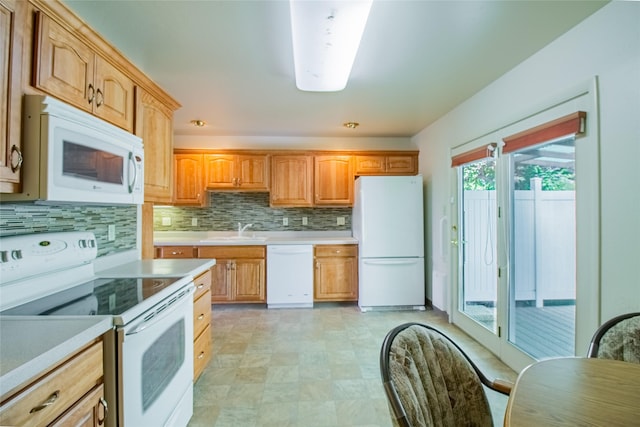 3455 N Hillcrest Dr, Butte, MT 59701 - kitchen with white appliances, light countertops, and tasteful backsplash
