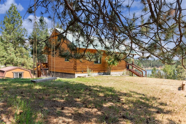 168 Carpenter Ln, Eureka, MT 59917 - view of grassy yard with stairway