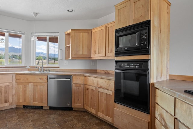 1228 Nordheim Ln, Corvallis, MT 59828 - kitchen featuring black appliances, light brown cabinets, light countertops, a textured ceiling, and open shelves