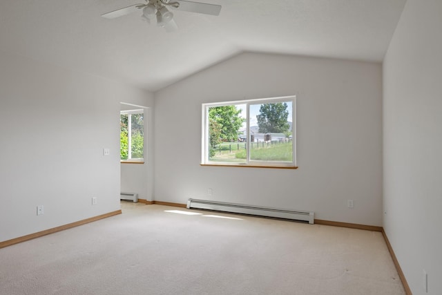 1228 Nordheim Ln, Corvallis, MT 59828 - carpeted spare room featuring a baseboard heating unit, a ceiling fan, and lofted ceiling