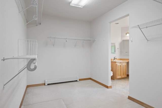 1228 Nordheim Ln, Corvallis, MT 59828 - spacious closet with a baseboard radiator and carpet