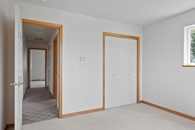 1228 Nordheim Ln, Corvallis, MT 59828 - unfurnished bedroom with carpet, a closet, and baseboard heating