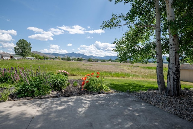 1228 Nordheim Ln, Corvallis, MT 59828 - view of yard featuring a mountain view and a view of rural / pastoral area