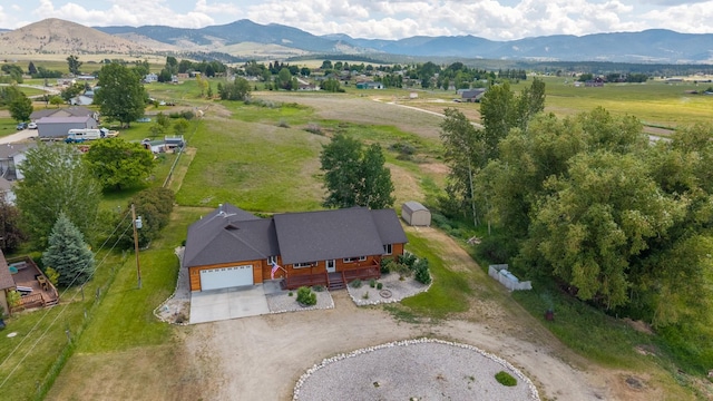 1228 Nordheim Ln, Corvallis, MT 59828 - aerial overview of property's location with a mountain backdrop and rural landscape
