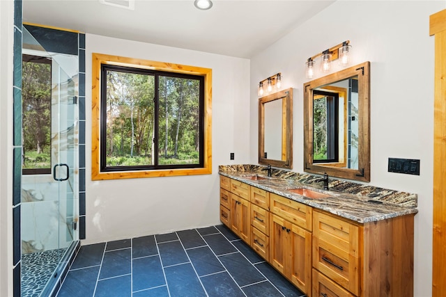 600 Ringneck Dr, Kalispell, MT 59901 - full bathroom with double vanity and a shower stall