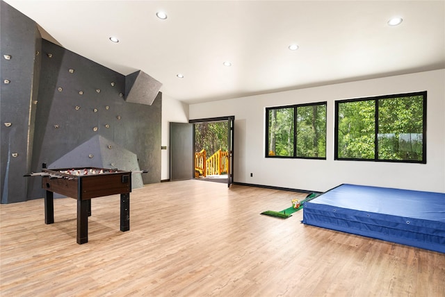 600 Ringneck Dr, Kalispell, MT 59901 - game room with light wood-style flooring, recessed lighting, and lofted ceiling