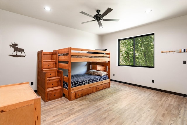 600 Ringneck Dr, Kalispell, MT 59901 - bedroom with wood finished floors, recessed lighting, and a ceiling fan