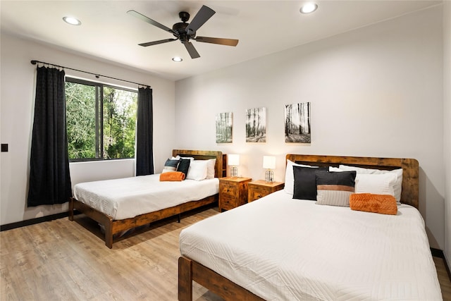 600 Ringneck Dr, Kalispell, MT 59901 - bedroom with light wood finished floors, recessed lighting, and a ceiling fan