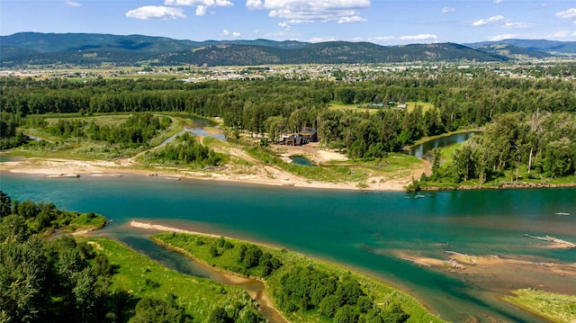 600 Ringneck Dr, Kalispell, MT 59901 - view of property location with a water and mountain view and a forest