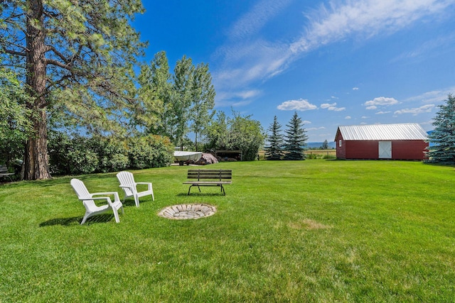 1380 Lower Valley Rd, Kalispell, MT 59901 - view of green lawn featuring an outdoor structure and an outbuilding