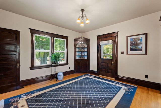 1380 Lower Valley Rd, Kalispell, MT 59901 - entrance foyer with wood finished floors and a chandelier