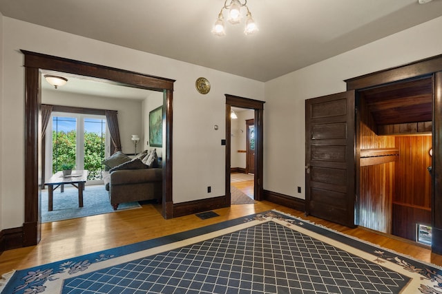 1380 Lower Valley Rd, Kalispell, MT 59901 - interior space with wood finished floors and a chandelier