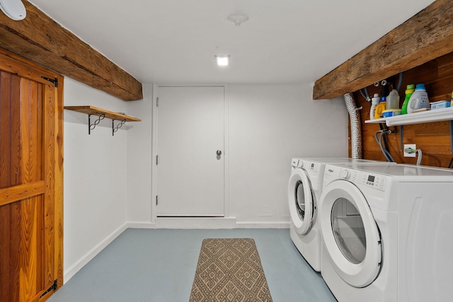 1380 Lower Valley Rd, Kalispell, MT 59901 - washroom featuring washing machine and dryer and baseboards