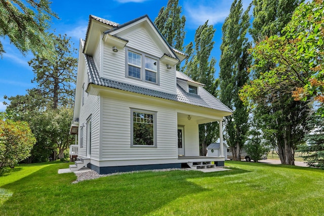1380 Lower Valley Rd, Kalispell, MT 59901 - back of property with a yard and covered porch