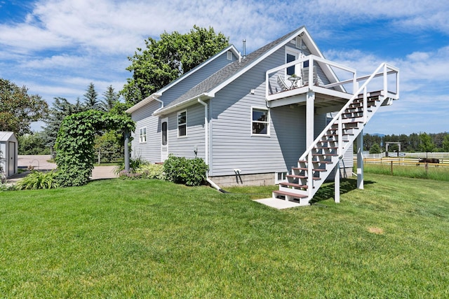 1380 Lower Valley Rd, Kalispell, MT 59901 - view of property exterior featuring stairway and a lawn