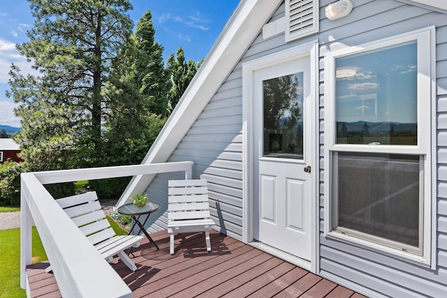 1380 Lower Valley Rd, Kalispell, MT 59901 - view of exterior entry featuring a wooden deck