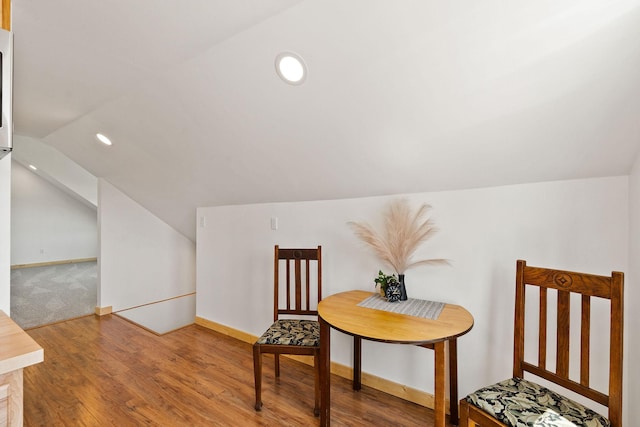 1380 Lower Valley Rd, Kalispell, MT 59901 - sitting room with lofted ceiling, wood finished floors, and recessed lighting